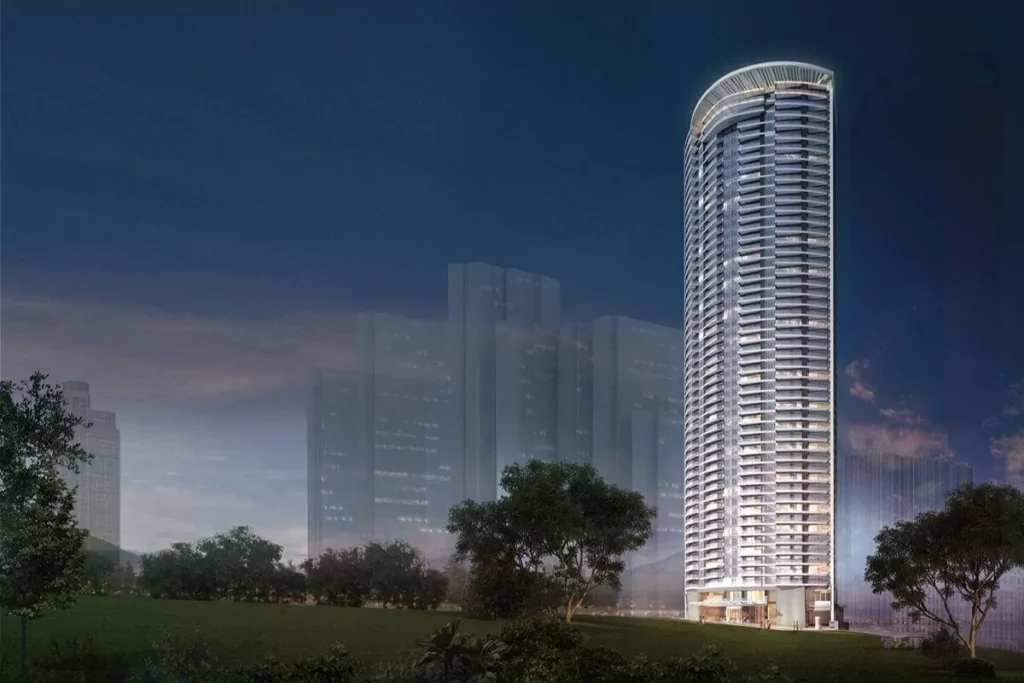 Ultra-luxury residential tower rising beside landscaped greenery, showcasing exclusivity, premium design, and a prestigious urban setting