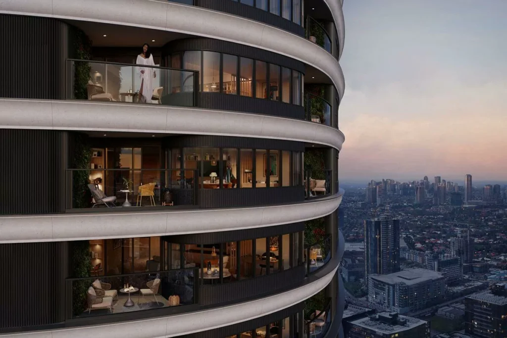 Luxury high-rise residences with private balconies overlooking the city skyline, representing long-term family wealth and legacy ownership