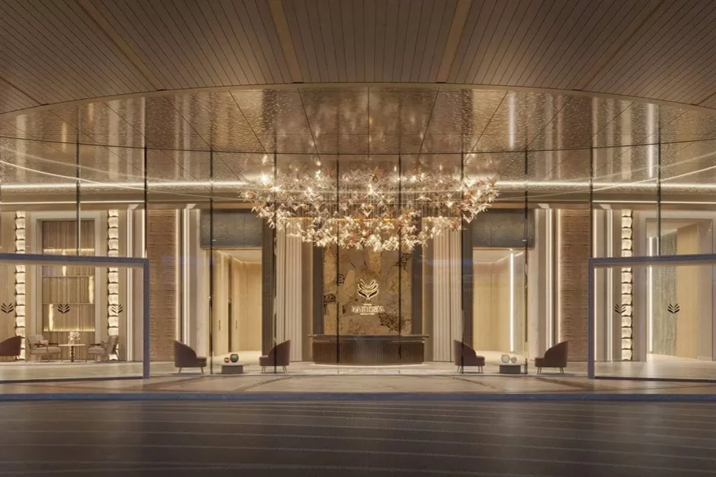 Grand luxury condominium entrance with dramatic chandelier lighting and polished finishes, reflecting premium property value in Cebu City