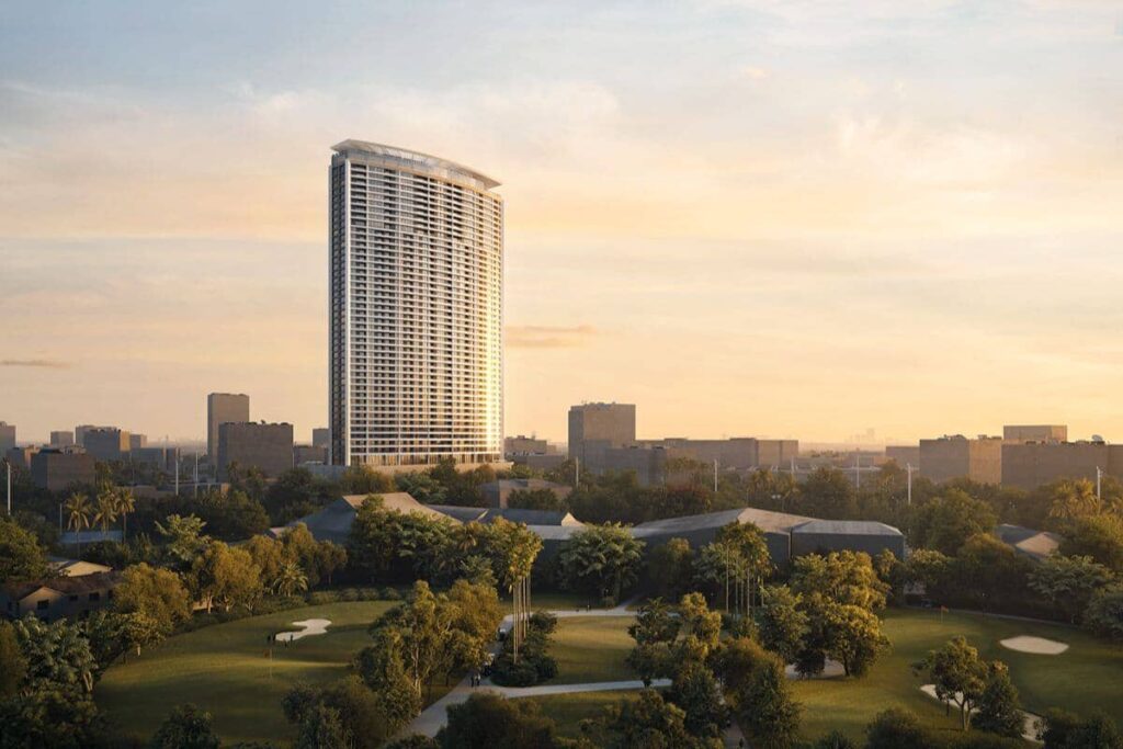 Shang Bauhinia Residences rising above the Cebu City skyline and lush green surroundings at sunset