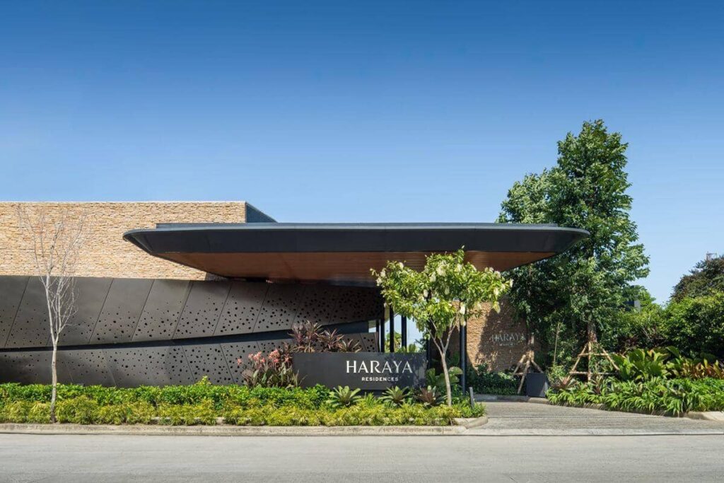 Haraya Residences entrance with landscaped greenery and modern architectural design